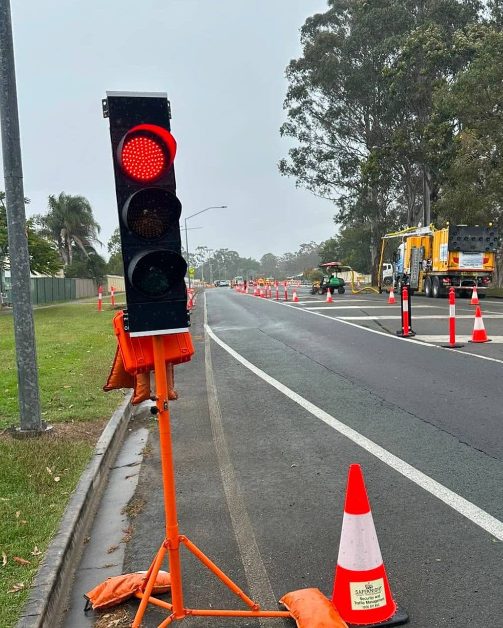 Safe Knight portable traffic light showing red at a lane closure